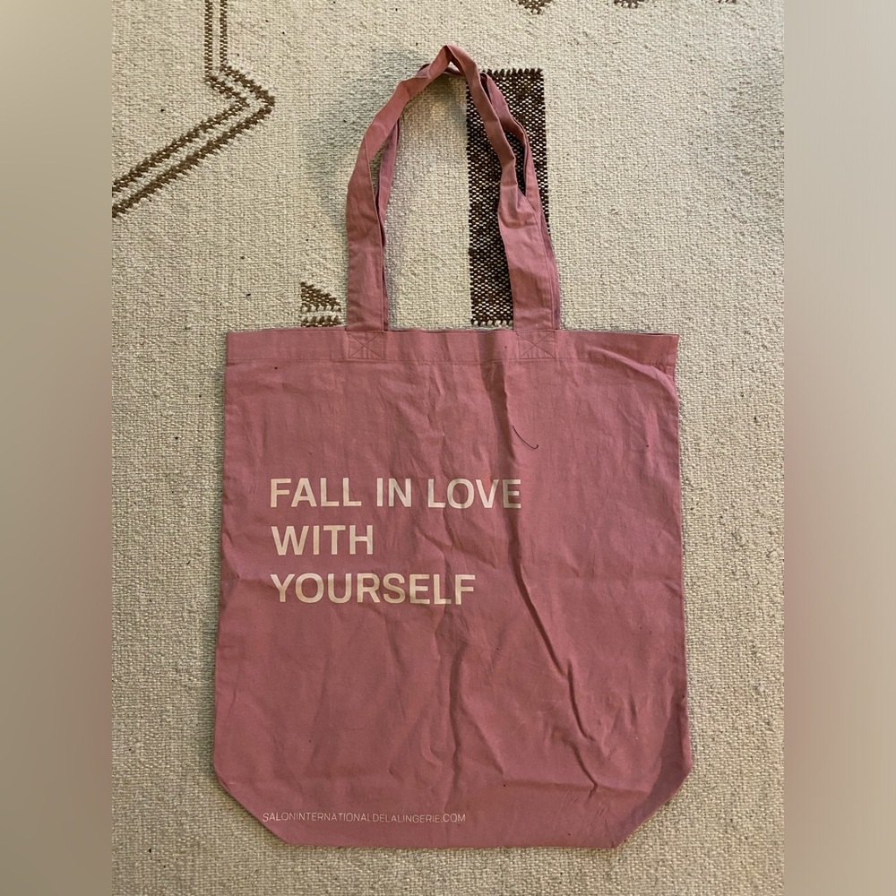 Aubade pink tote bag with "fall in love with yourself" print measures 18x 19.5”